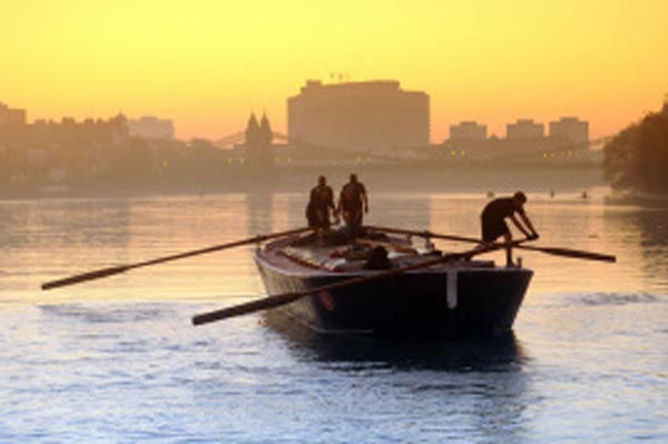 Lightermen at sunset (c) Simon Michael