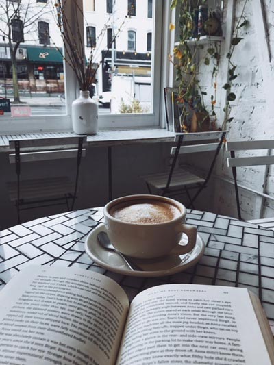 Coffee shop reading in NYC (c) CBTB