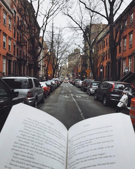 Reading in the streets of NYC (c) CBTB