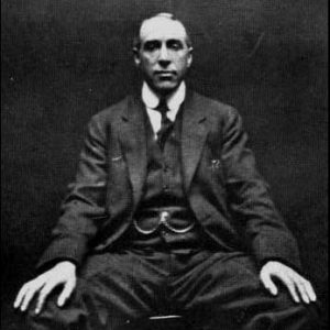 A photograph of paranormal investigator Harry Price, taken by spirit photographer William Hope in 1922