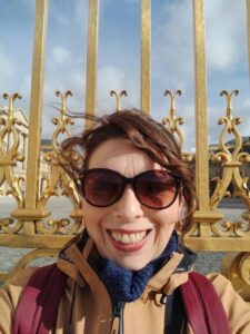 Anya Bergman outside golden gates of Versailles on research trip (c) Anya Bergman